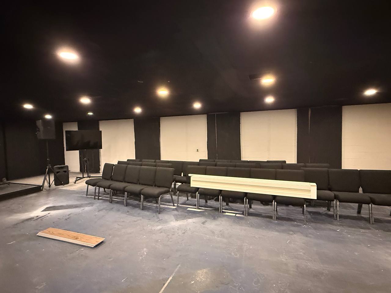 In progress — ceiling blacked out and new recessed lighting installed