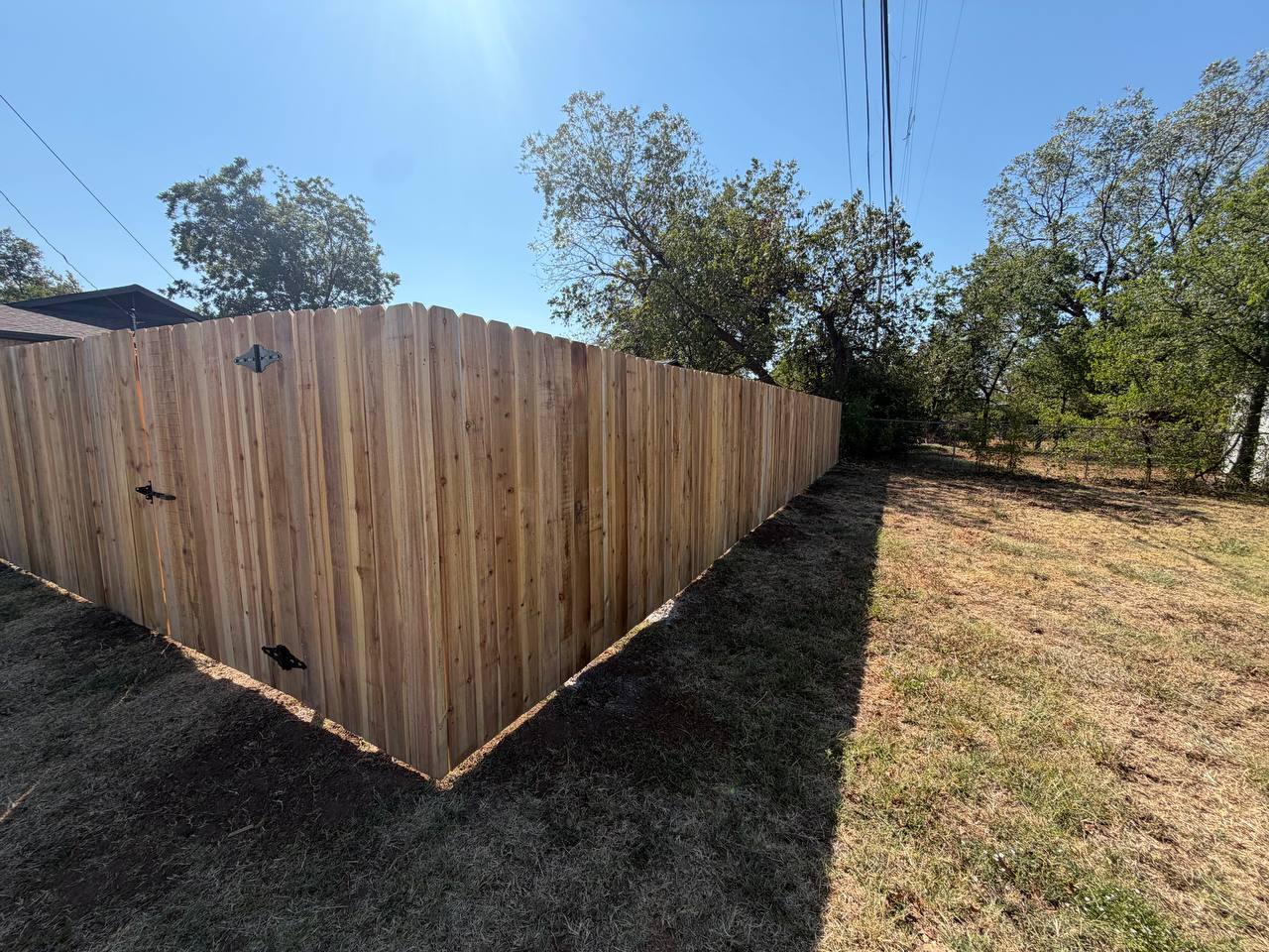 Corner detail on the completed cedar fence