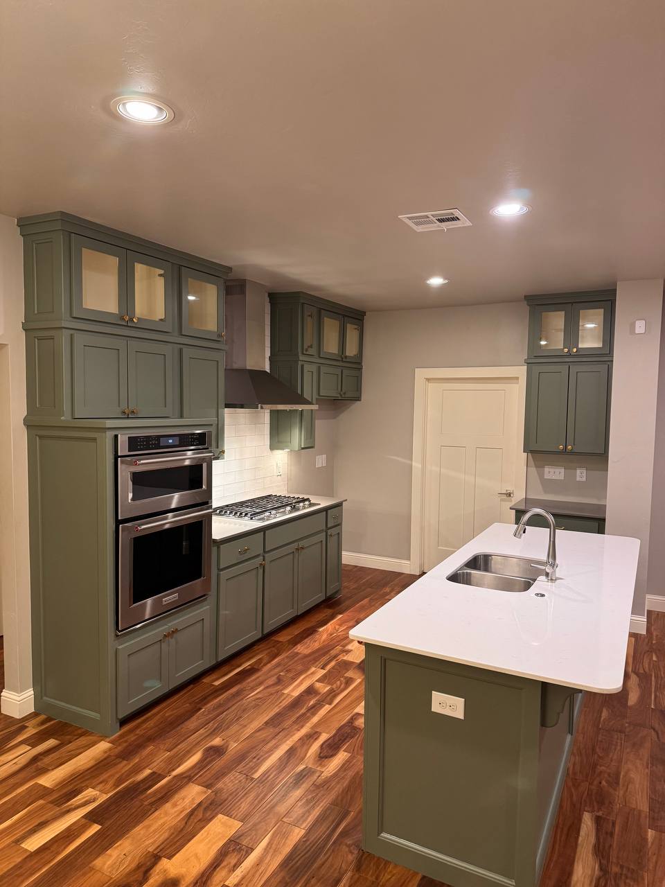 Finished range wall with brass hardware