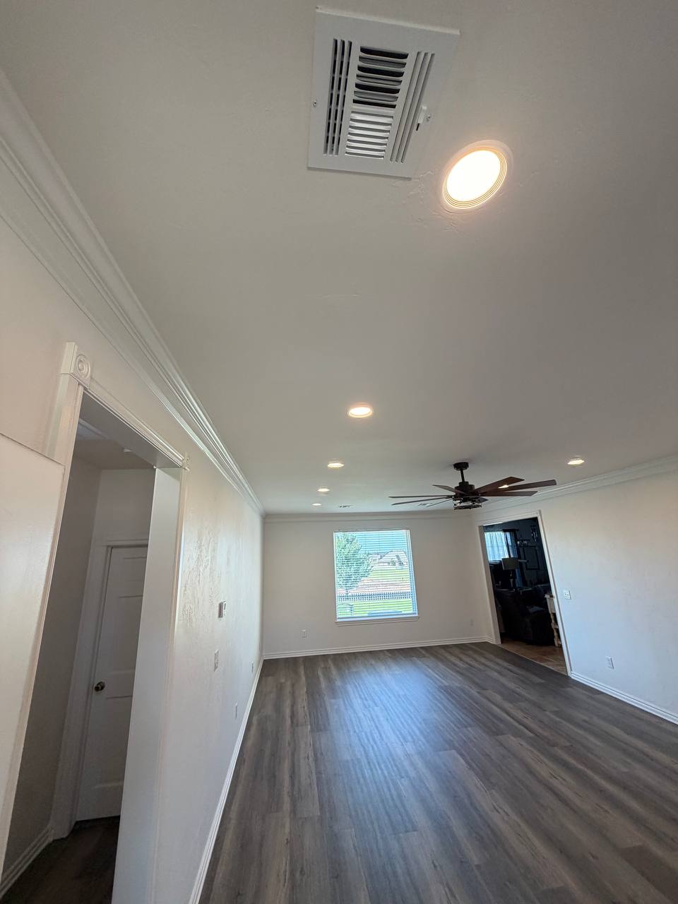 After — fresh crown molding & recessed lighting