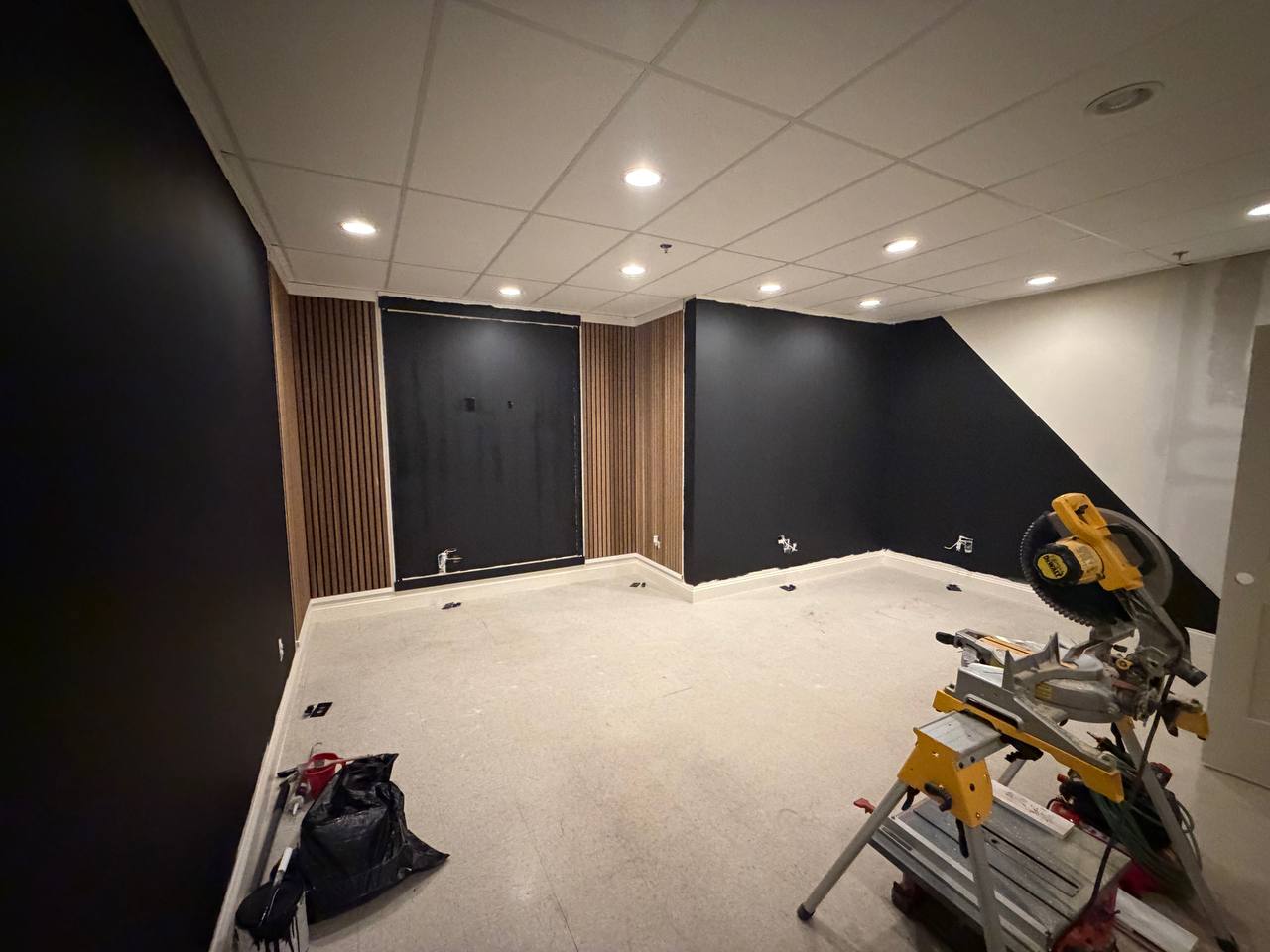 Walls painted black with a diagonal two-tone accent