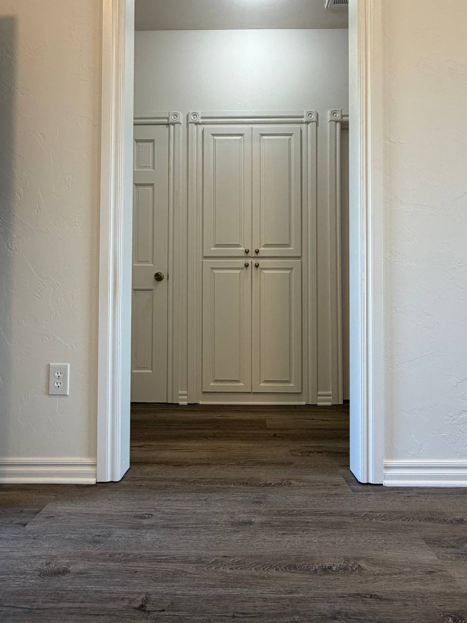 Detail — hallway with custom panel doors
