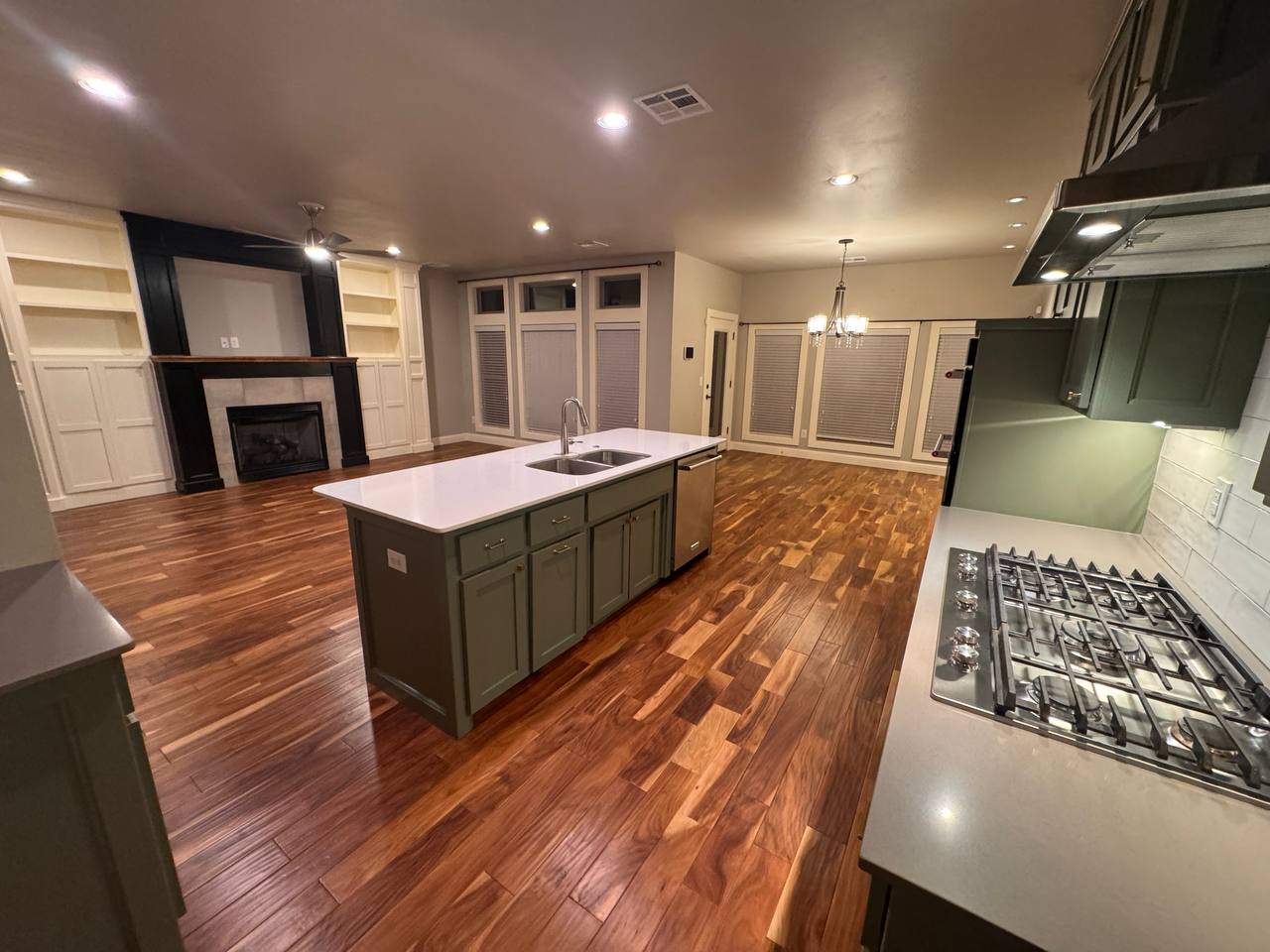 Open view to living room & fireplace
