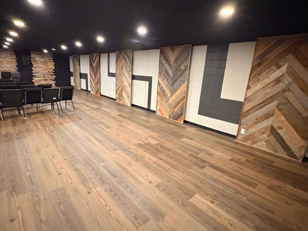 Custom accent paneling and reclaimed-wood walls going up