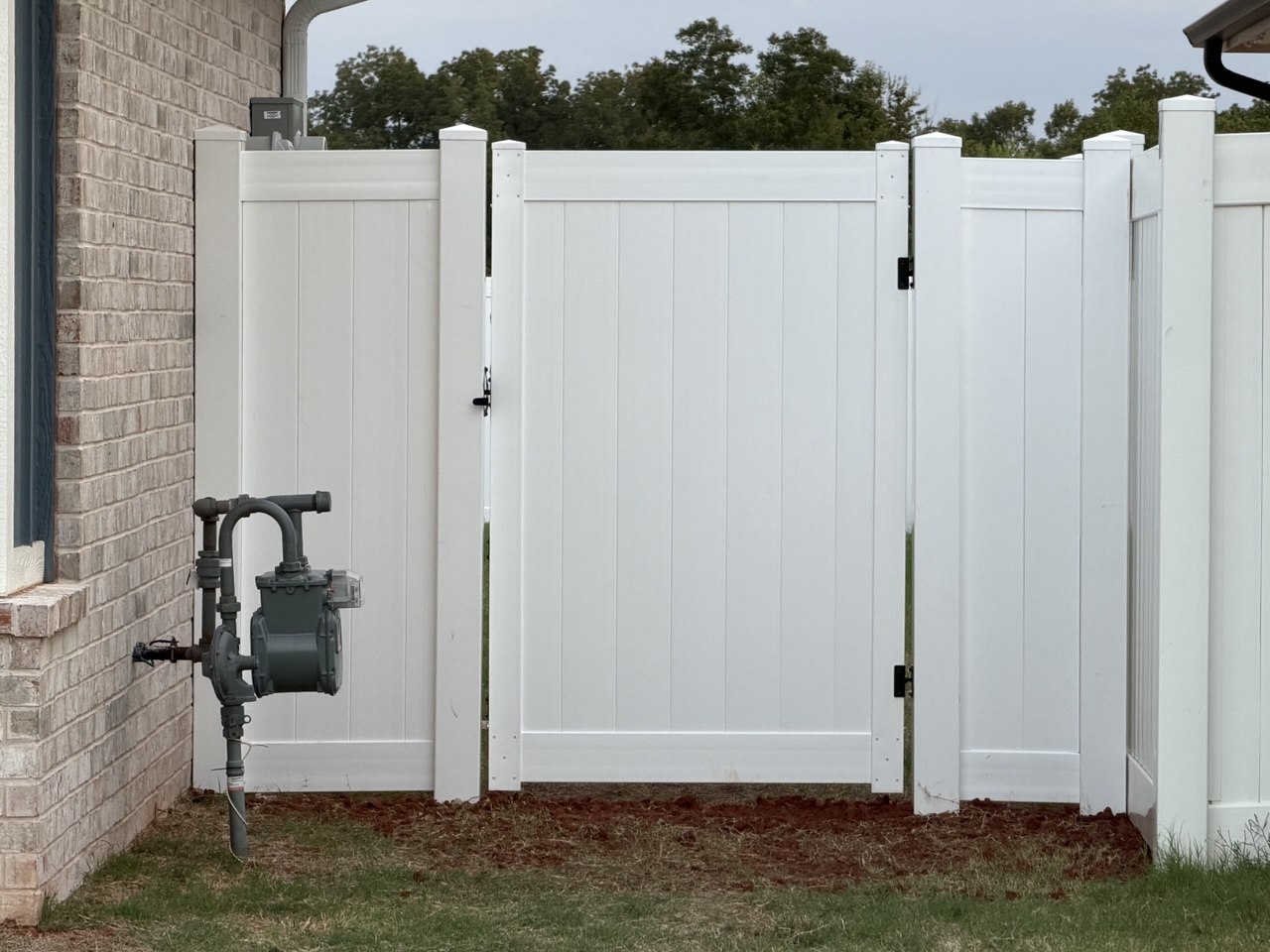 Walk-through gate hung with heavy-duty black hardware
